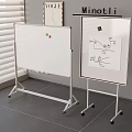Two Mobile Whiteboards With Wheels Near Window Blinds And VOGUE Magazine