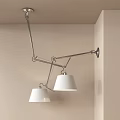 Modern Adjustable Wall Lamp With Two White Lampshades And Metal Arm Mounted On Beige Wall