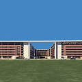 Modern School Building Design With Green Roof Sports Field And Surrounding Trees