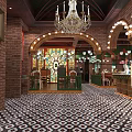 Traditional Restaurant Exterior With Colorful Domes Red Brick Walls And Arched Wrought Iron Gates