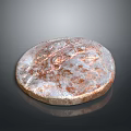 Ancient Circular Coin With Rusted Metallic Surface And Historical Engraved Design