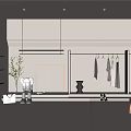 Modern Clothing Store Interior Featuring Racks With Hanging Apparel And Decorative Items