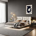 Modern White Double Bed With Upholstered Headboard Pillows Nightstand Lamp And Wall Art