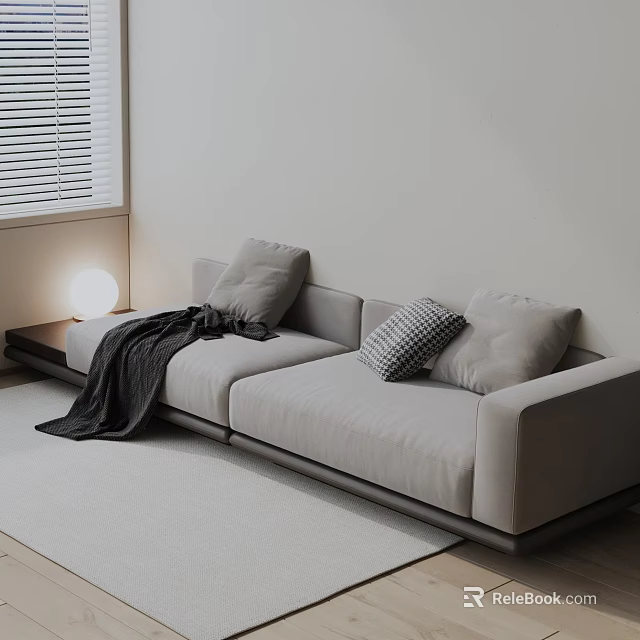 Modern Gray Three Seater Sofa With Plaid Cushion Throw Blanket Small Lamp In Living Room 3d model 