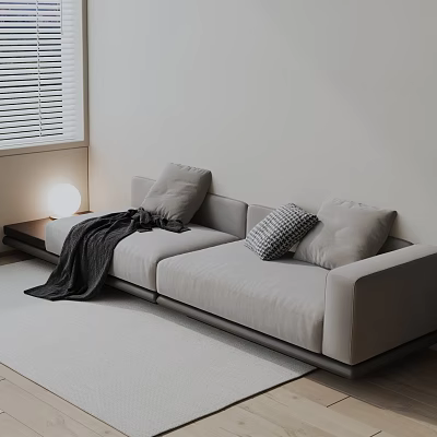 Modern Gray Three Seater Sofa With Plaid Cushion Throw Blanket Small Lamp In Living Room 3d model