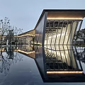 Modern Sales Center With Glass Curtain Wall Sloped Roof And Water Reflection