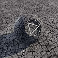 Road Facilities Circular Object With White Triangular Sign On Cracked Pavement 3d model