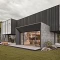 Modern Forest House With Large Glass Windows Black Exterior And Natural Surroundings