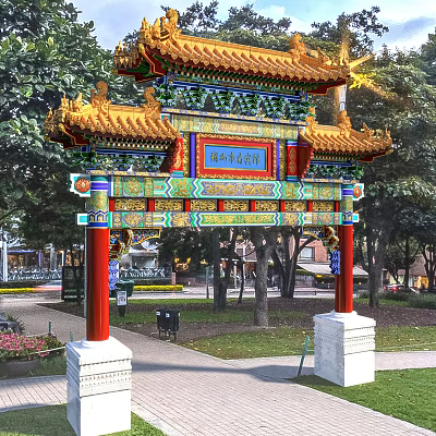 Traditional Chinese Archway With Yellow Roof Colorful Decorations Red Pillars Blue Plaque And Green Trees 3d model
