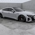 White Sports Coupe With Sleek Design In Modern Indoor Space With Reflective Floor