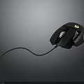 Black Wired Gaming Mouse With Yellow Logo And Modern Ergonomic Design