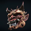 Traditional Horned Mask Featuring Intricate Red Gold And Black Decorative Patterns
