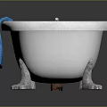 Elegant White Clawfoot Bathtub With Blue Towel And Silver Faucet