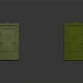 Green Military Storage Crates With Yellow Text Labels And Worn Surface Design