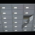 Gray Metal File Cabinets With Multiple Drawers Some Partially Open And Label Slots