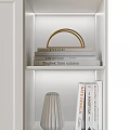 Modern White Wardrobe With Gold Handles And Open Shelves With Decorative Items And Lighting