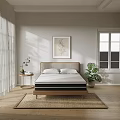 Double Bed with Wooden Headboard in Bright Room Natural Light Potted Plant and Wall Art