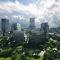 Modern Office Buildings in Urban Landscape With Green Trees and Tall Structures