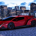 Red Sports Car Parked On Cobblestone Road With Urban City Skyline At Night