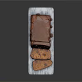 Homemade Fruit Loaf With Chocolate Glaze Sliced On Marble Serving Board