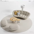 Curved Beige Sofa Coffee Table Set With Yellow Gray Cushions Round Ottoman And Floor Lamp