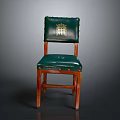 Classic Green Leather Chair With Wooden Frame And Golden Emblem On Backrest
