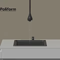 Poliform Black Faucet With Water Droplet Above Black Sink On White Countertop Against Beige Wall