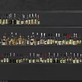 Neatly Arranged Wine Bottles And Glasses On Multi Layer Display Shelves With Gray Wall