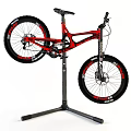 Red Mountain Bicycle on Repair Stand with DURO Tires and Suspension System