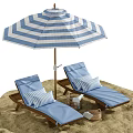 Blue Wicker Lounge Chairs With Striped Pillows Under Beach Umbrella On Sand