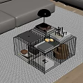 Modern Metal Grid Coffee Table With Laptop Books Tea Set And Gray Sofa