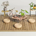 Cozy Rustic Tea Table Setup With Woven Cushions Green Plants And Wooden Floor