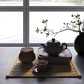 Elegant Tea Set with Teapot Teacup and Jar on Bamboo Mat by Window with Branch Vase