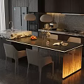 Modern Kitchen Interior With Illuminated Black Island And Dining Chairs