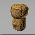 Textured Champagne Cork With Engraved CHAMPAGNE Lettering Isolated On Dark Background
