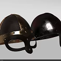 Two Medieval Riveted Helmets With Gold Accents And Bloodstained Red Finish