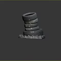 Car Tires Stacked in Pyramid Shape with Various Sizes and Worn Tread Patterns