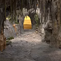 Natural Cave Interior With Stalactites Stalagmites Yellow Light And Gravel