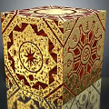 Decorative Gold Red Cube With Intricate Patterns And Symbols For Home Decor