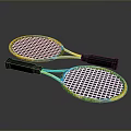 Two Colorful Tennis Rackets With Yellow Blue Frames And Black Grips