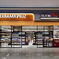 Modern Supermarket General Merchandise Store With Deli Section And Shelves Of Products At Glass Entrance