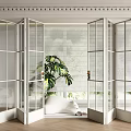 Glass Folding Doors In Modern Interior Design With White Walls And Green Plants