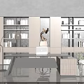 Modern Large Grey Bookcase In Study Room With Desk Laptop Floor Lamp And Green Plants