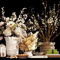 White Ceramic Vase With Pink Flowers And Decorative Branches On Table With Books And Boxes