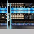 Modern Hotel Lobby With Blue LED Screens Bar Counter High Stools And Ambient Lighting