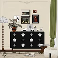 Black Entryway Console Cabinet With White Flower Decorations Vase Books And Floor Lamp Wall Artwork