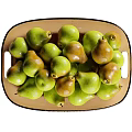 Fresh Ripe Green Pears Arranged in Bowls and Pile on Plates