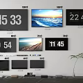 Various Size Televisions With Time Displays And Scenic Wallpapers On Wall