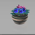 Potted Plant With Blue Purple And Pink Flowers Green Leaves In Striped Green Beige Pot