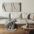 Three Seater Wicker Sofa With Soft Cushions Throw Blanket Wooden Side Table And Wall Art